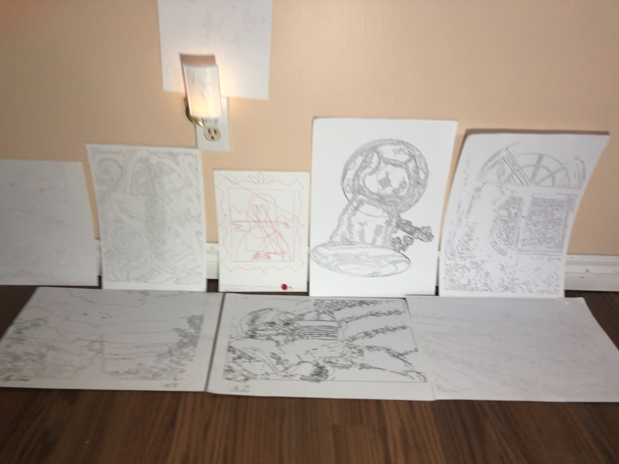 Several detailed drawings displayed together after being produced with the pen plotter
