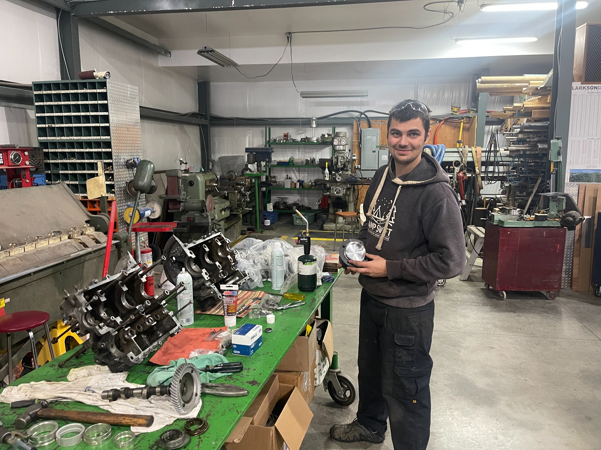 Andrii rebuilding the Volkswagen engine in the workshop