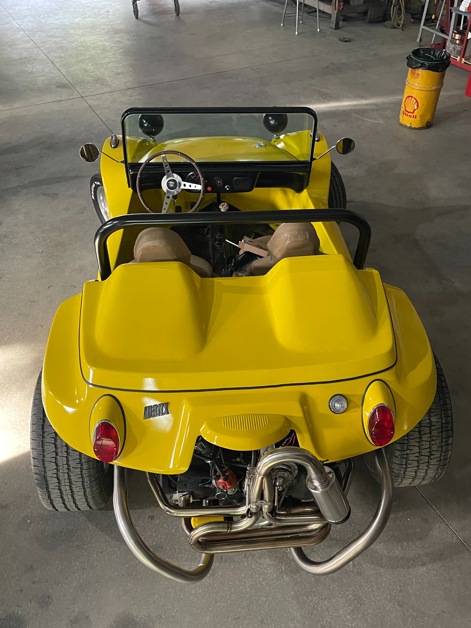 Rear view of the completed Manx dune buggy showing its lights and exhaust