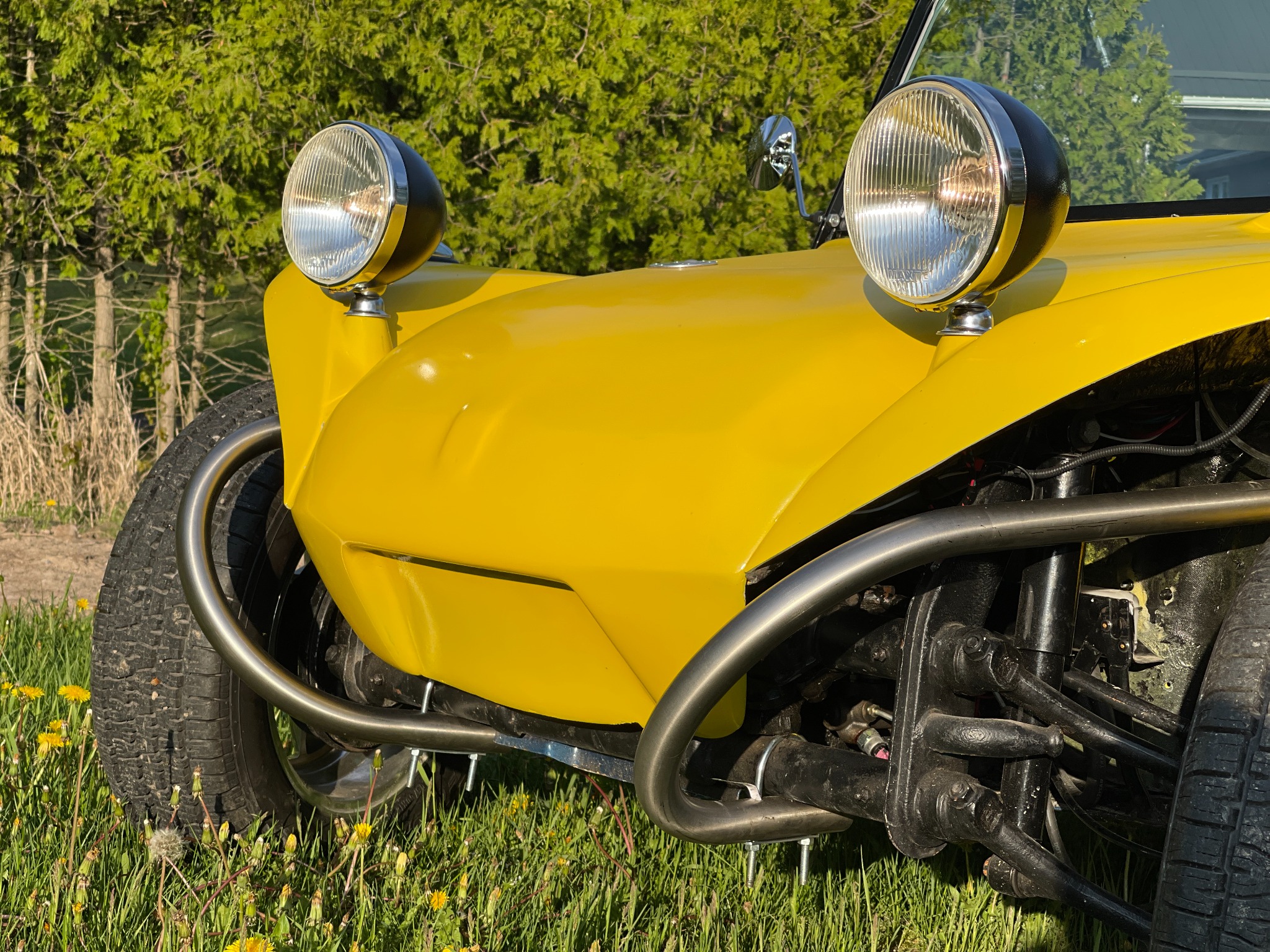 Close view of the completed yellow front bodywork and headlights